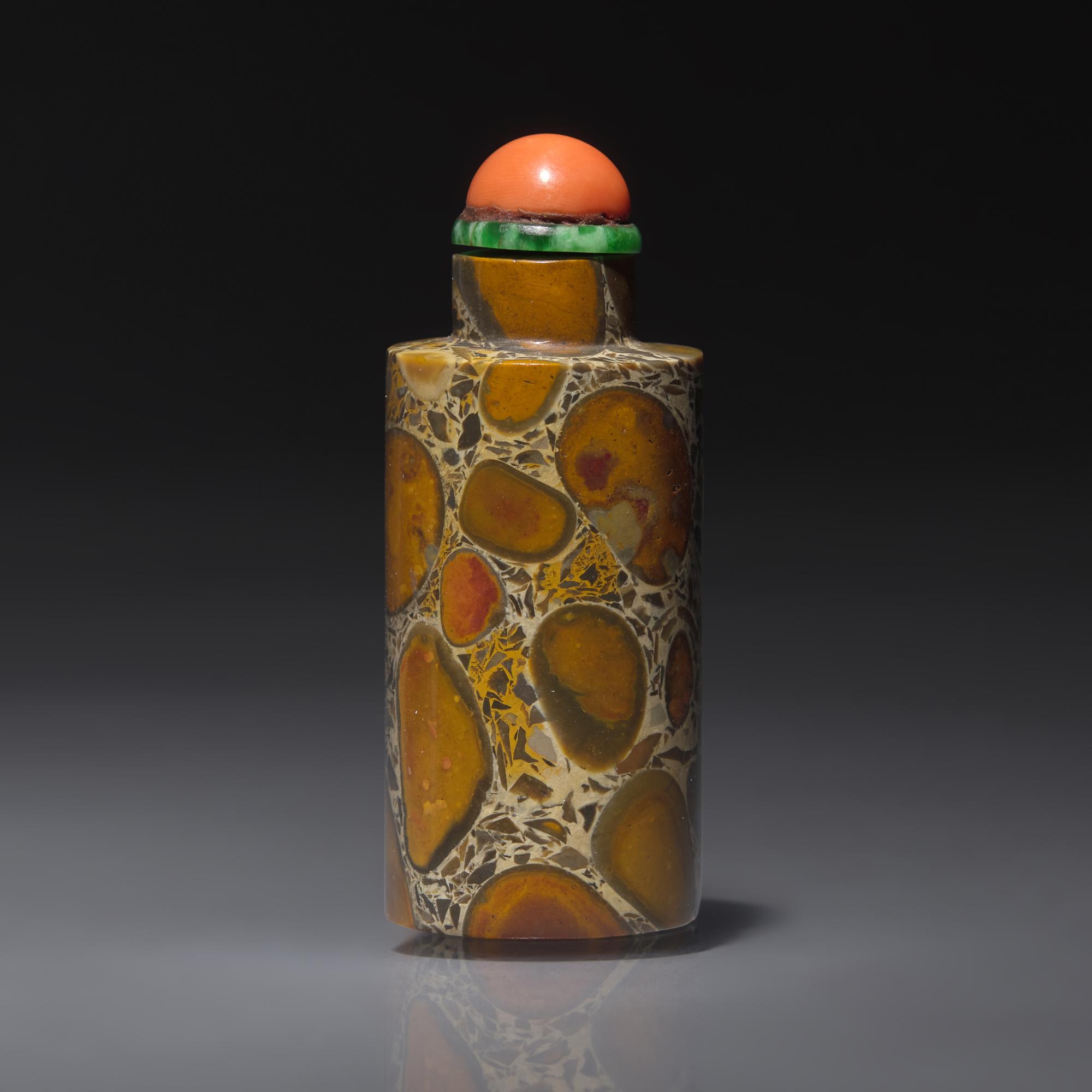 A Chinese Puddingstone Snuff Bottle, Qing Dynasty, Circa 1760-1880 — 1760-1880年 抱子石素面鼻煙壺