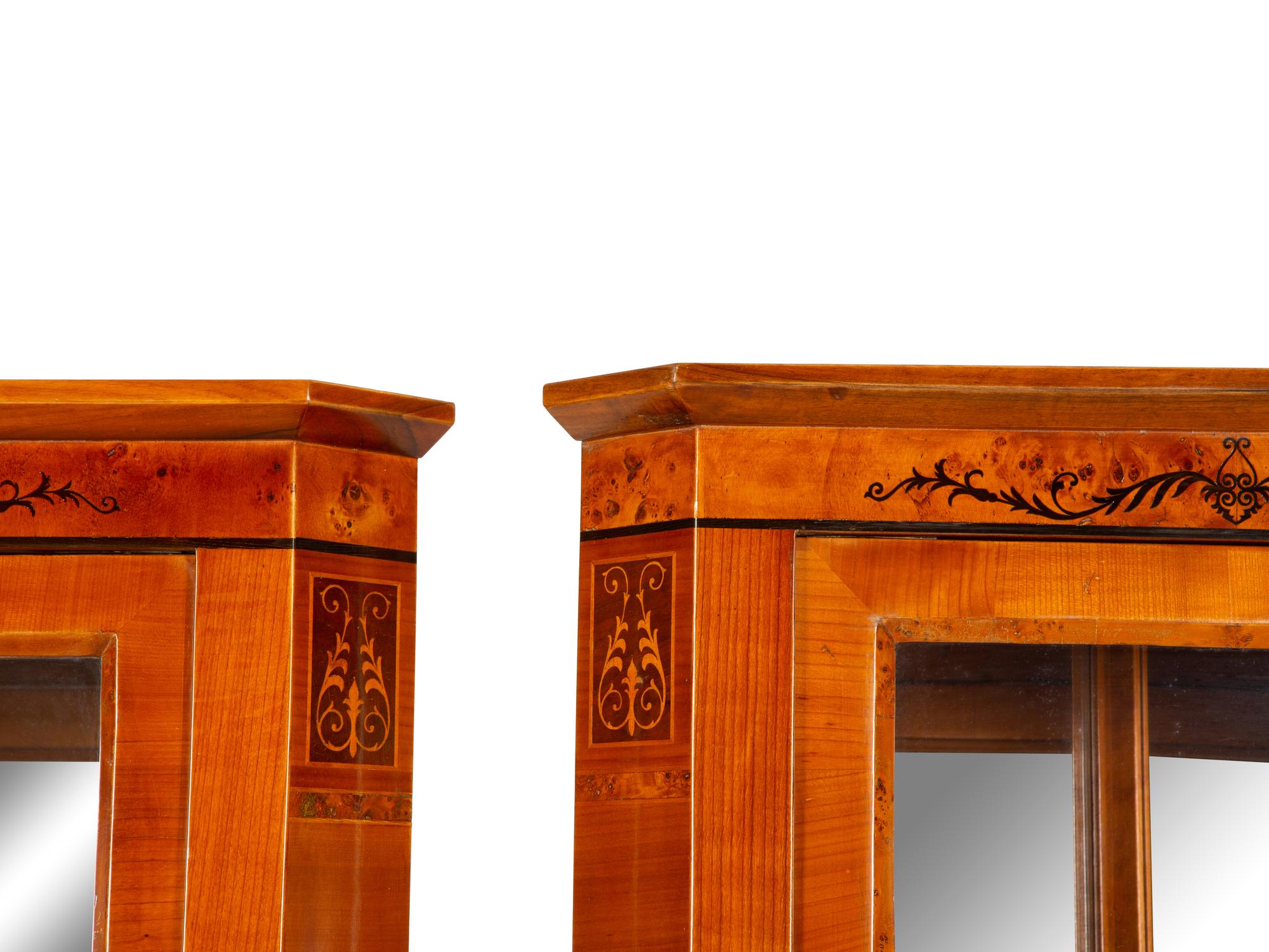 A Pair of Biedermeier Bird's Eye Maple and Walnut Corner Cabinets — Mid-19th Century