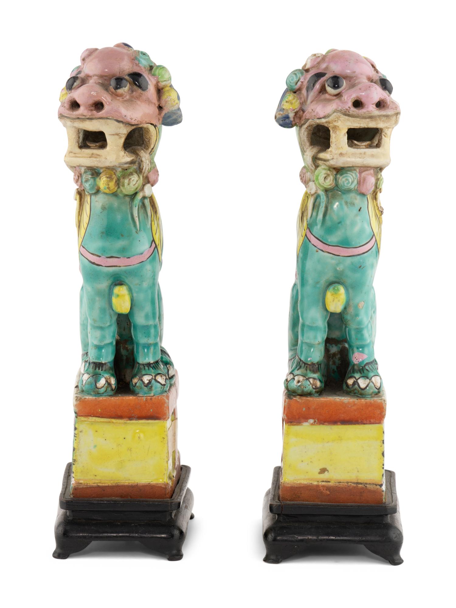 A Pair of Chinese Famille Rose Porcelain Fu Dogs