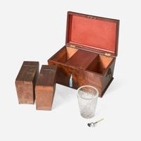 A Classical carved mahogany work table together with Regency mahogany tea caddy The table probably Baltimore, MD, circa 1820-1830