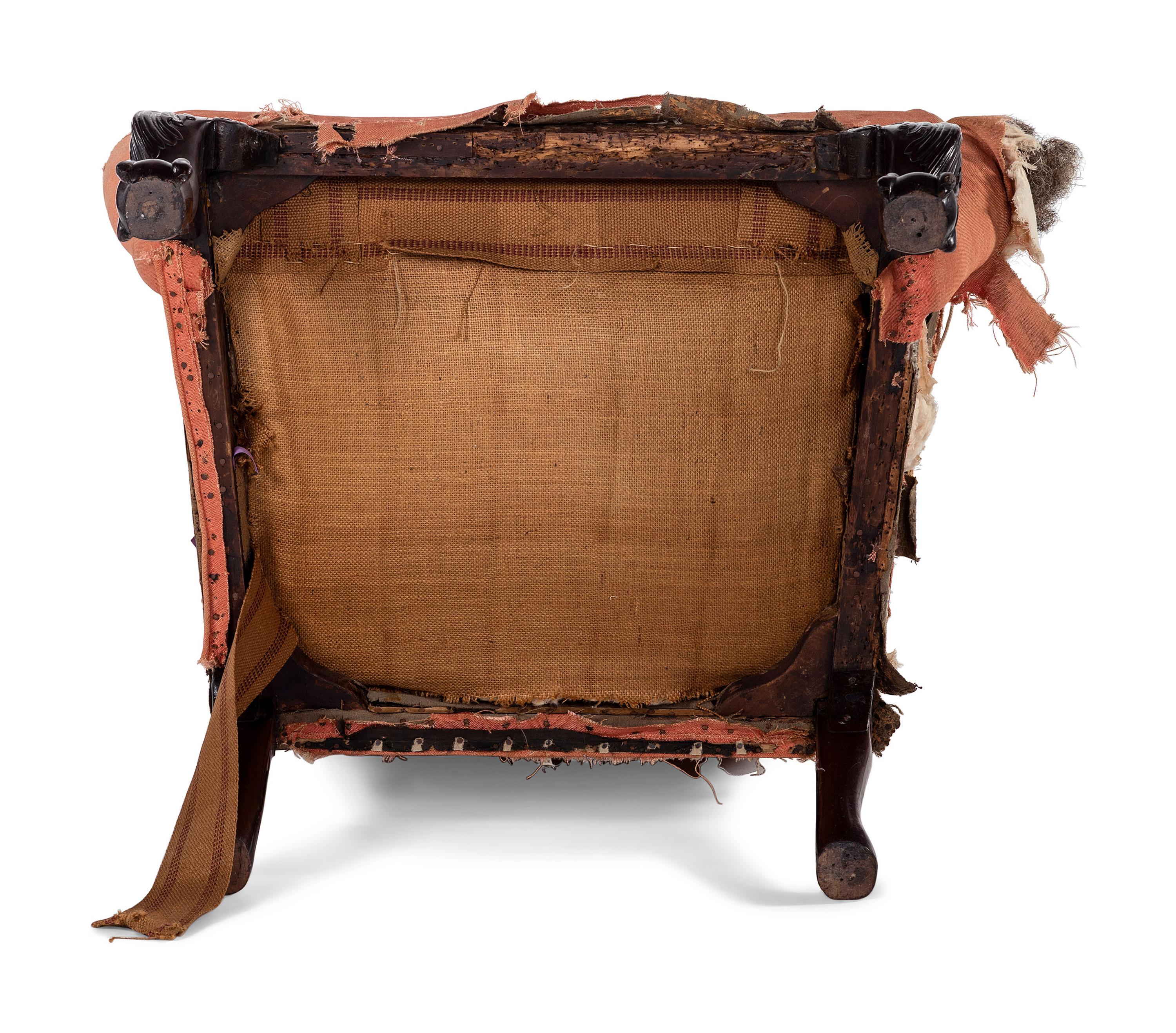 A George II Carved Mahogany Claw-and-Ball Foot Easy Chair
