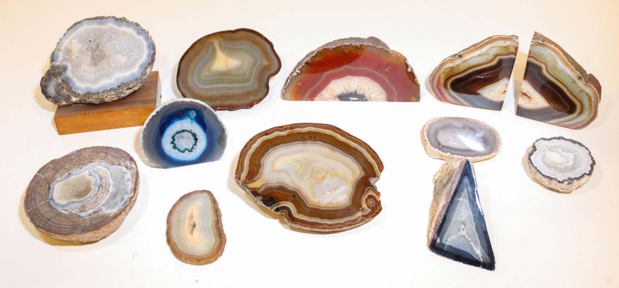 Twelve Marble Specimen Book Ends and Geodes. Height of tallest 4 1/4 inches.