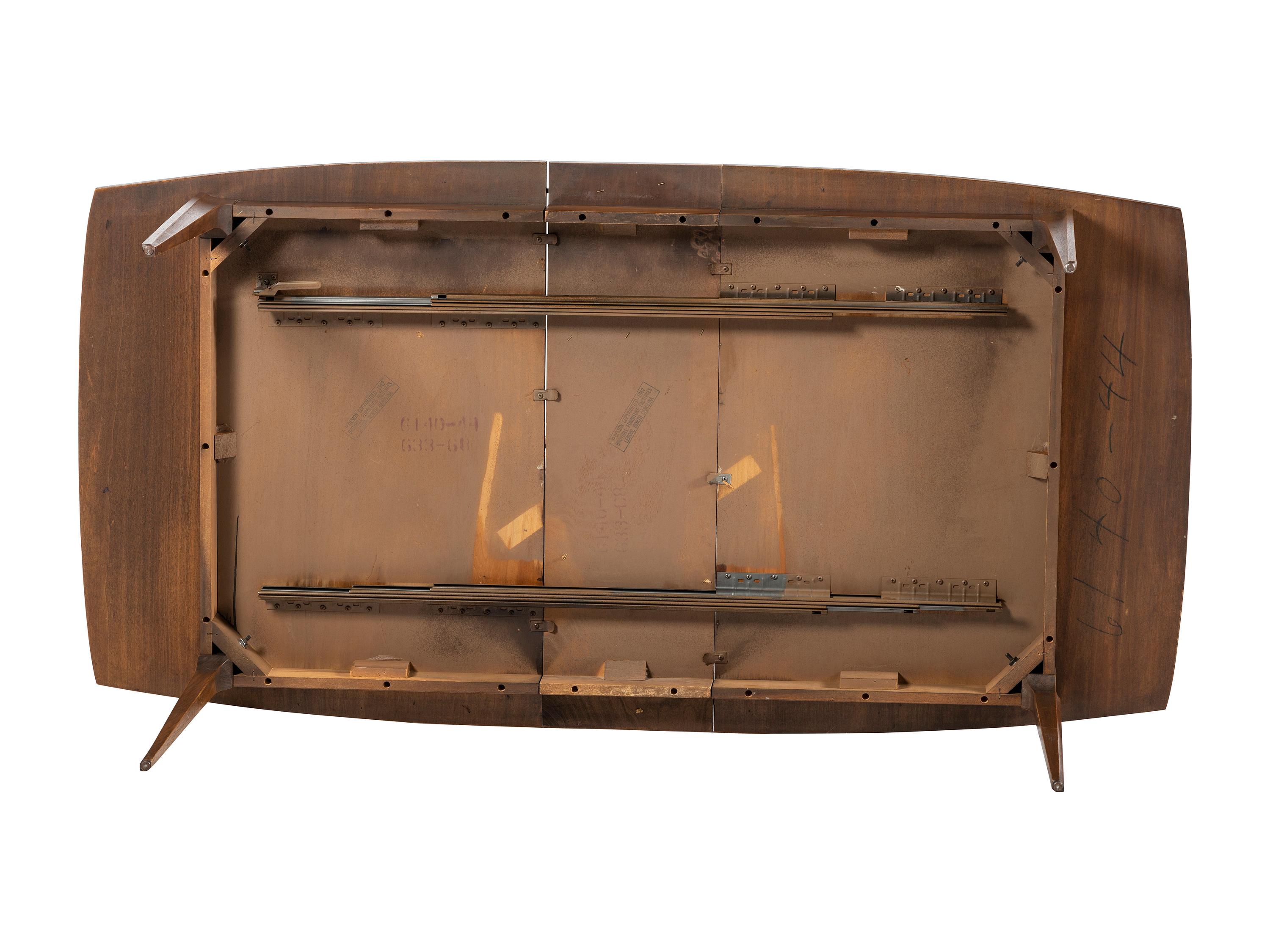 A Broyhill Brasilia Walnut Dining Table