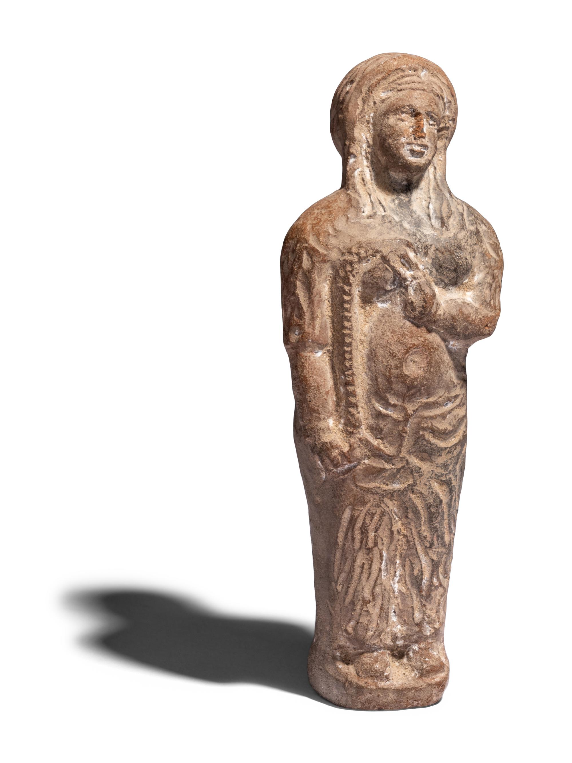 An Egyptian Terracotta Figure of Isis-Thermuthis