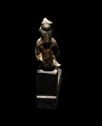 An Egyptian Bronze Isis with Baby Horus