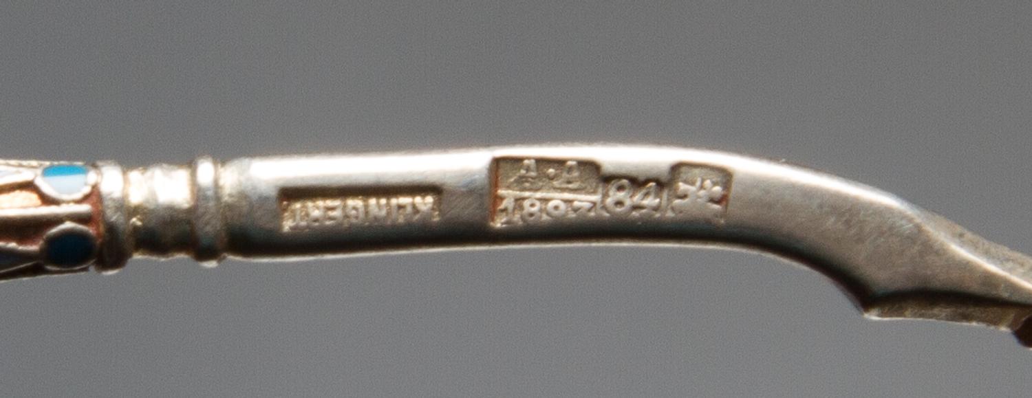 A Russian Silver-Gilt and Enamel Spoon, Mark of Gustav Klingert, assay mark of Anatoly Artsybashev, Moscow, 1893, the underside of the