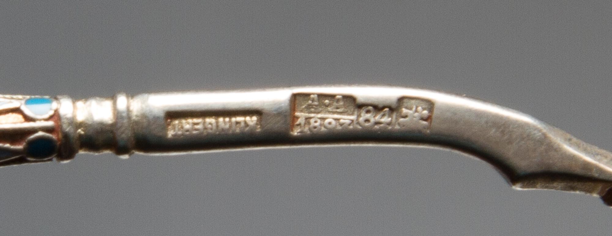 A Russian Silver-Gilt and Enamel Spoon, Mark of Gustav Klingert, assay mark of Anatoly Artsybashev, Moscow, 1893, the underside of the