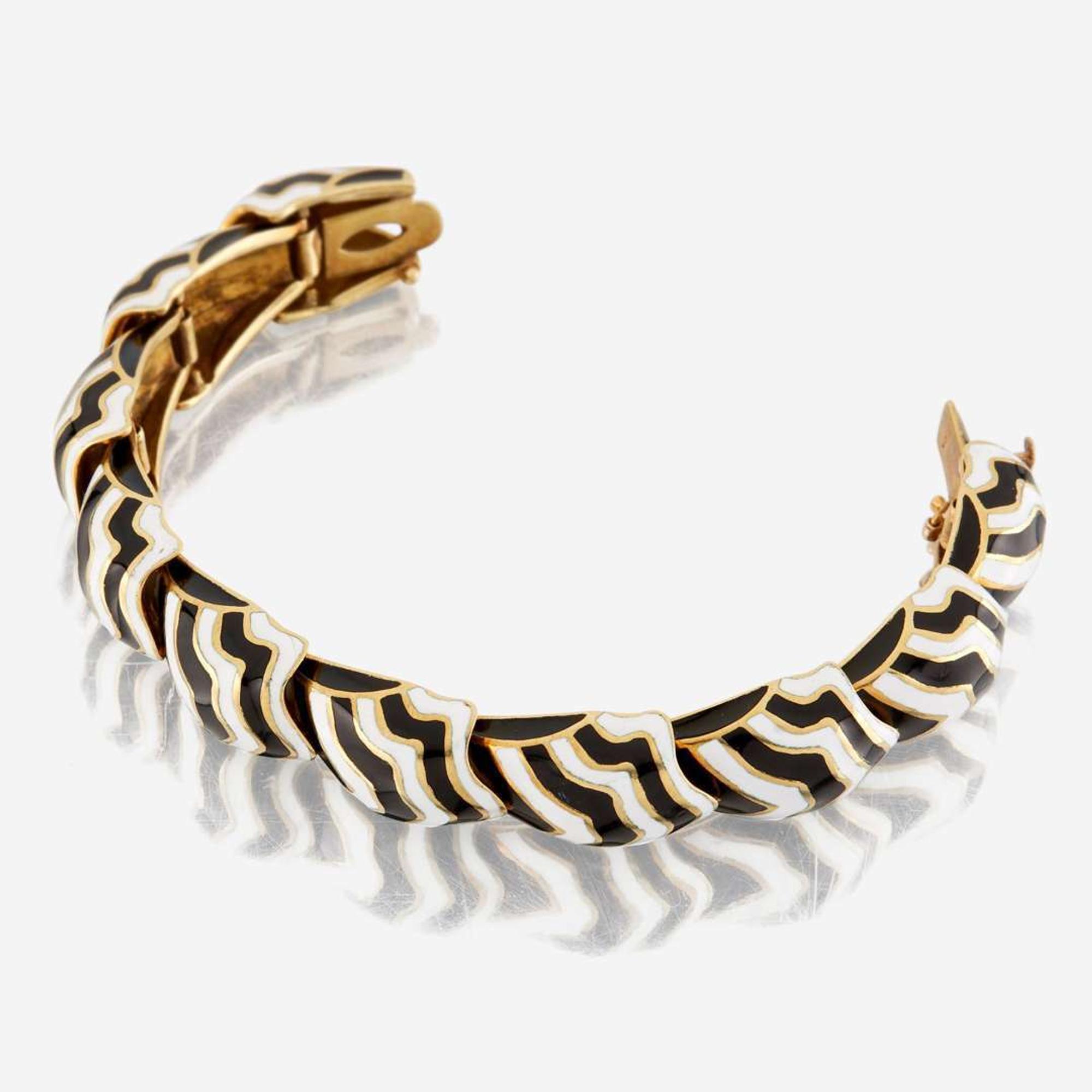 A gold and enamel bracelet