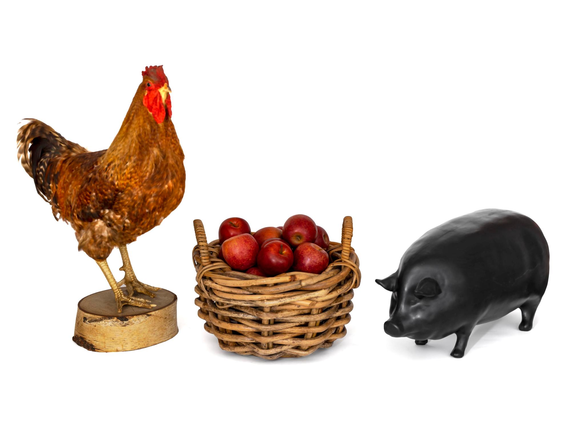 A Large Basket of Faux Apples, Additional Apples in Living Room, a Pig and a Rooster