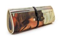 A Magazine Clutch, 12 1/2 x 5 x 2 inches.