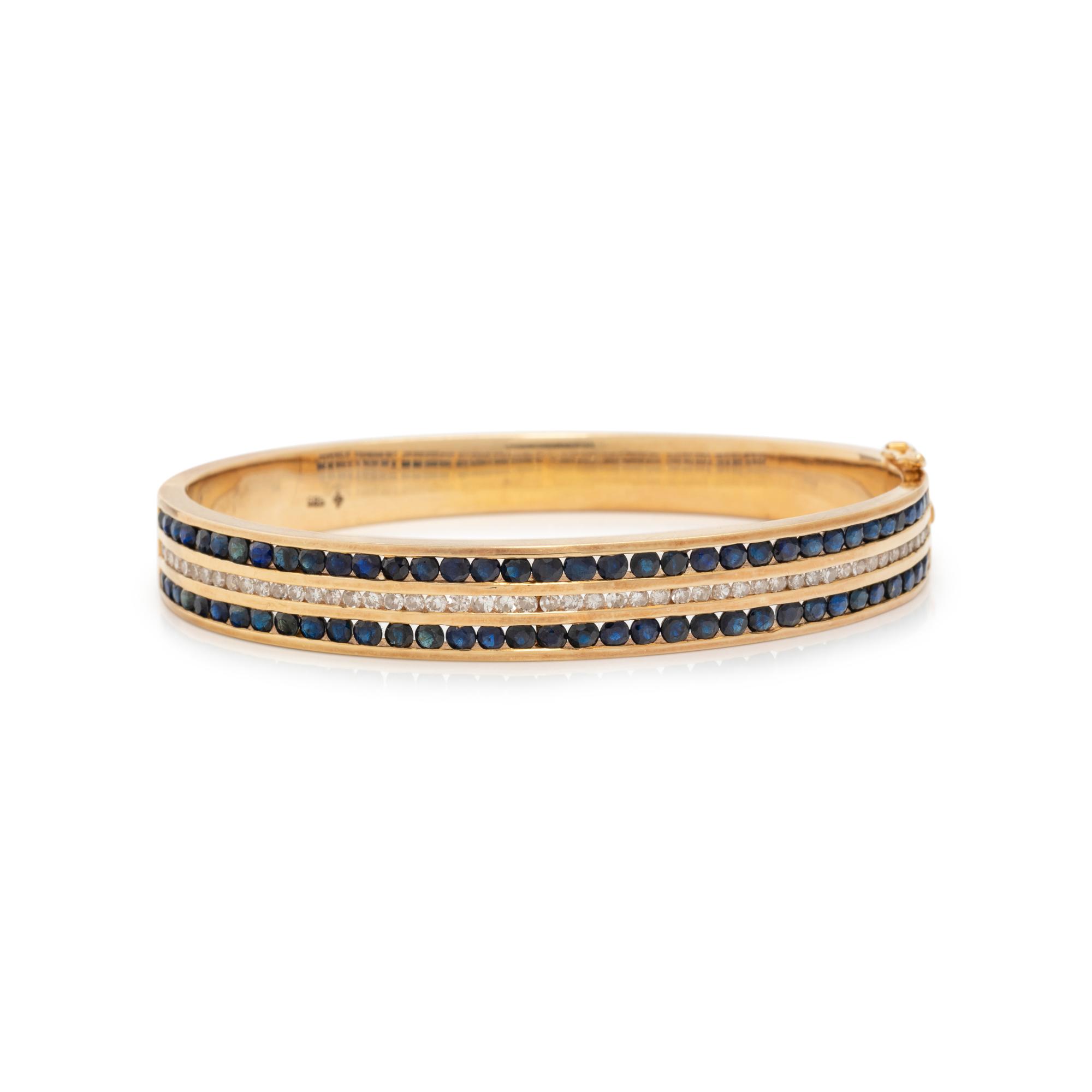 YELLOW GOLD, SAPPHIRE AND DIAMOND BANGLE BRACELET