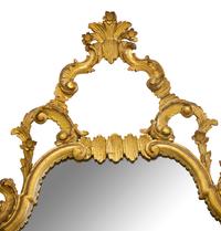 A Louis XV Style Carved Giltwood Mirror