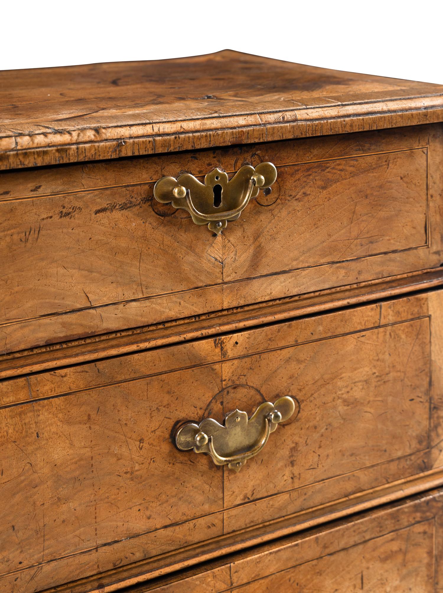 A George II Walnut Chest of Drawers