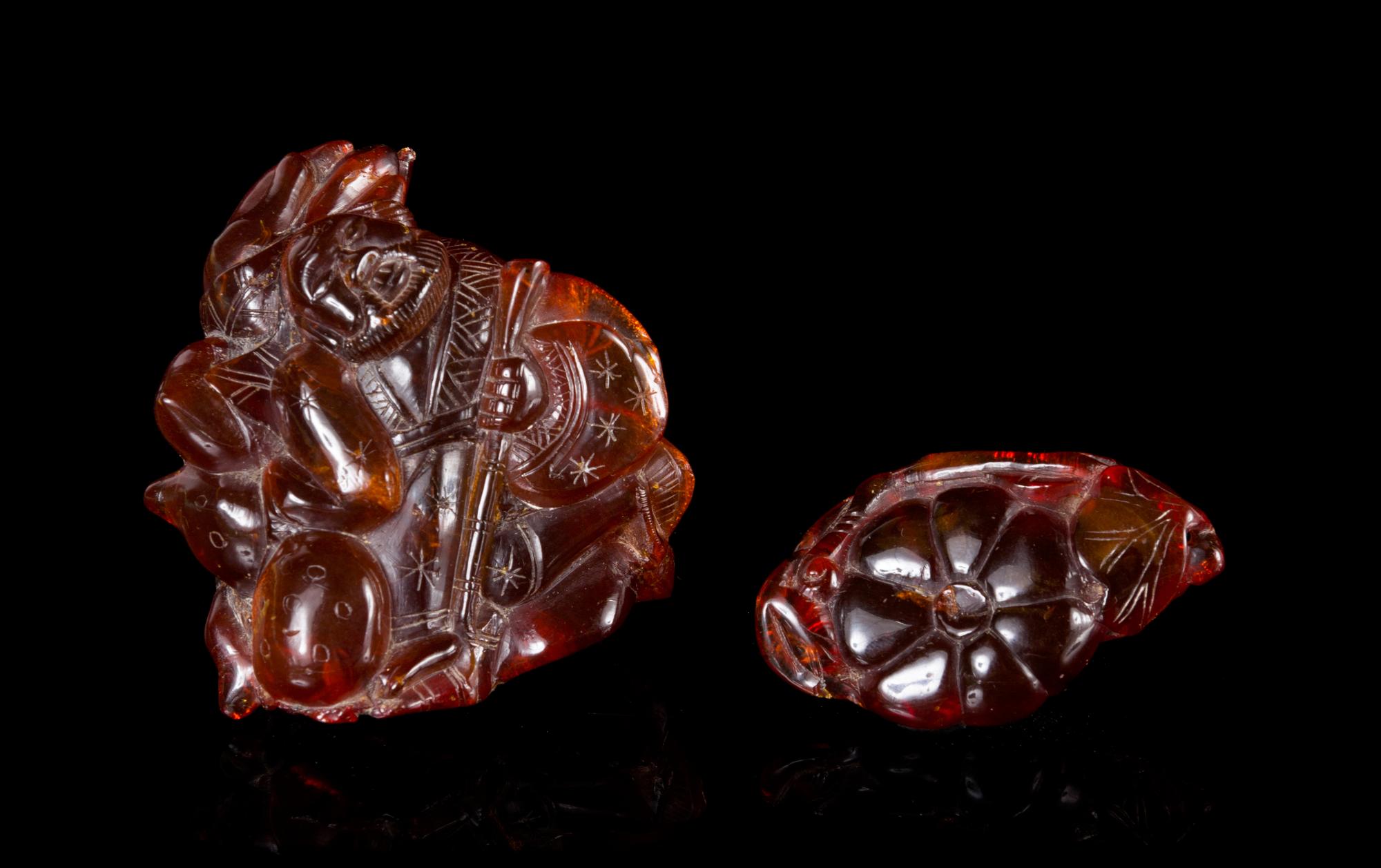Two Amber Toggles Height of larger 2 inches.