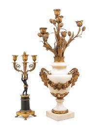 A Neoclassical Gilt Bronze Mounted White Marble Candelabrum and an Empire Style Gilt and Patinated Bronze Figural Candelabrum