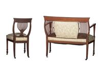 An Edwardian Mahogany Settee and Side Chair
