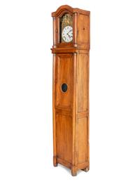 A French Repoussed Brass Comtoise Clock in Provincial Fruitwood Tall Case