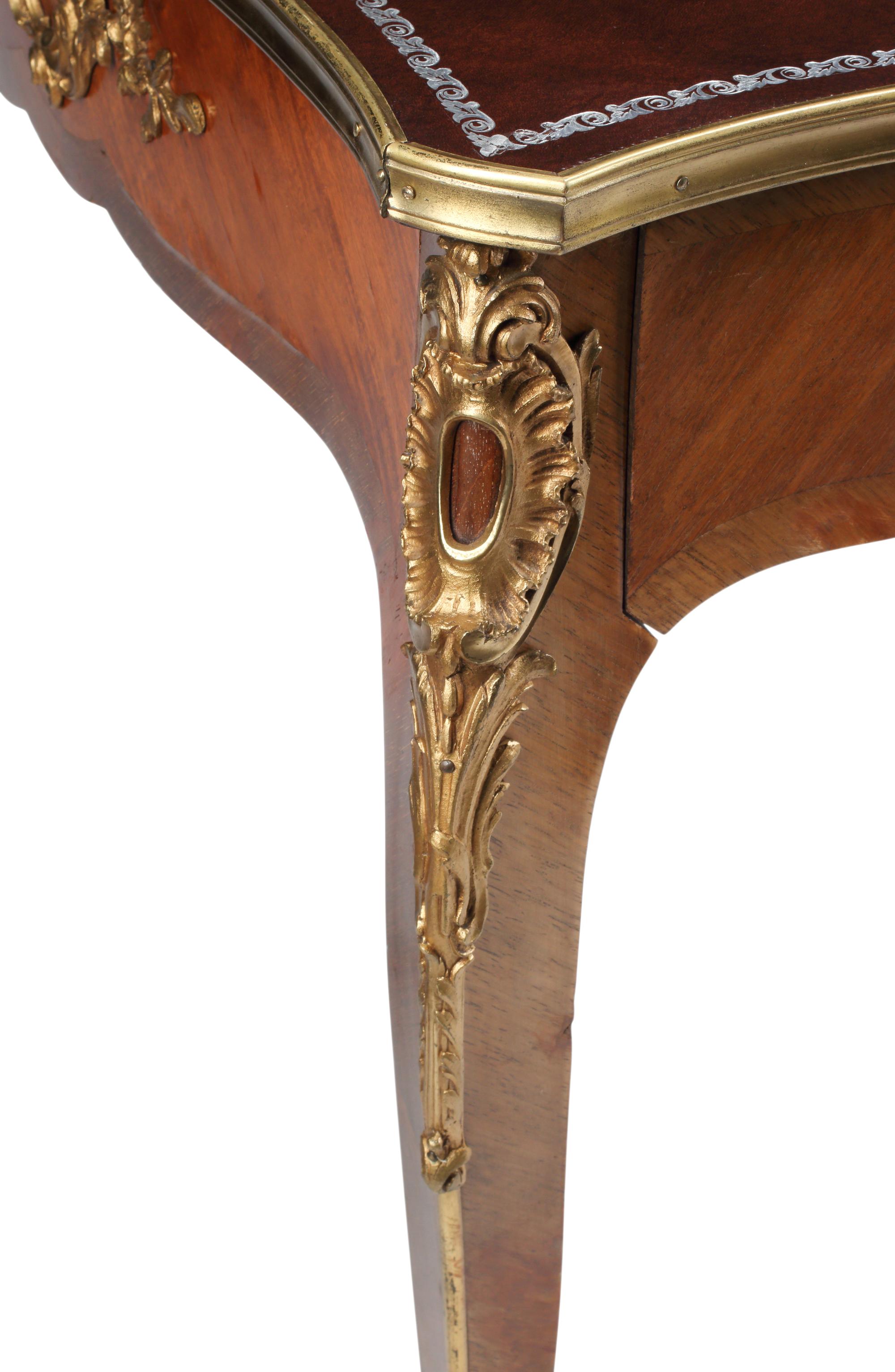 A Louis XV Style Gilt-Bronze Mounted Mahogany Bureau Plat
