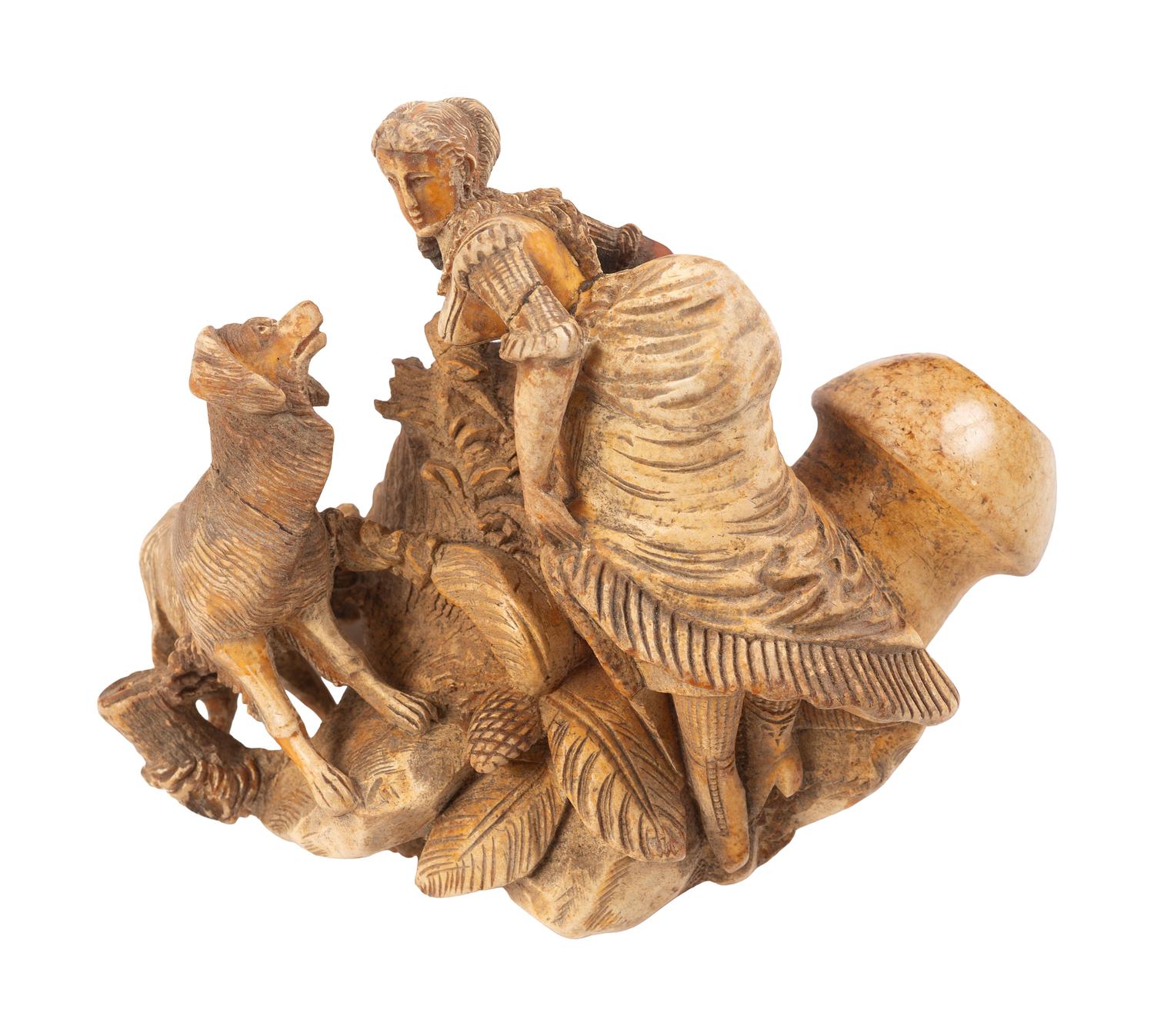 [AMERICANA - PIPES]. 2 ornately carved meerschaum pipes, each featuring animal motifs.