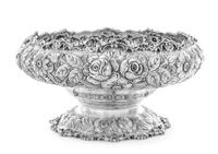 An American Silver Center Bowl, S. Kirk & Son, Baltimore, MD, the undulating rim formed of S-scrolls spaced with rocaille above the flo