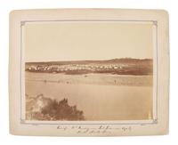 HOWARD, Charles (b. ca 1842-?), photographer. Three photographs of Fort Fetterman, Wyoming Territory, incl. camp of the 2nd Cavalry near the North Platte River.