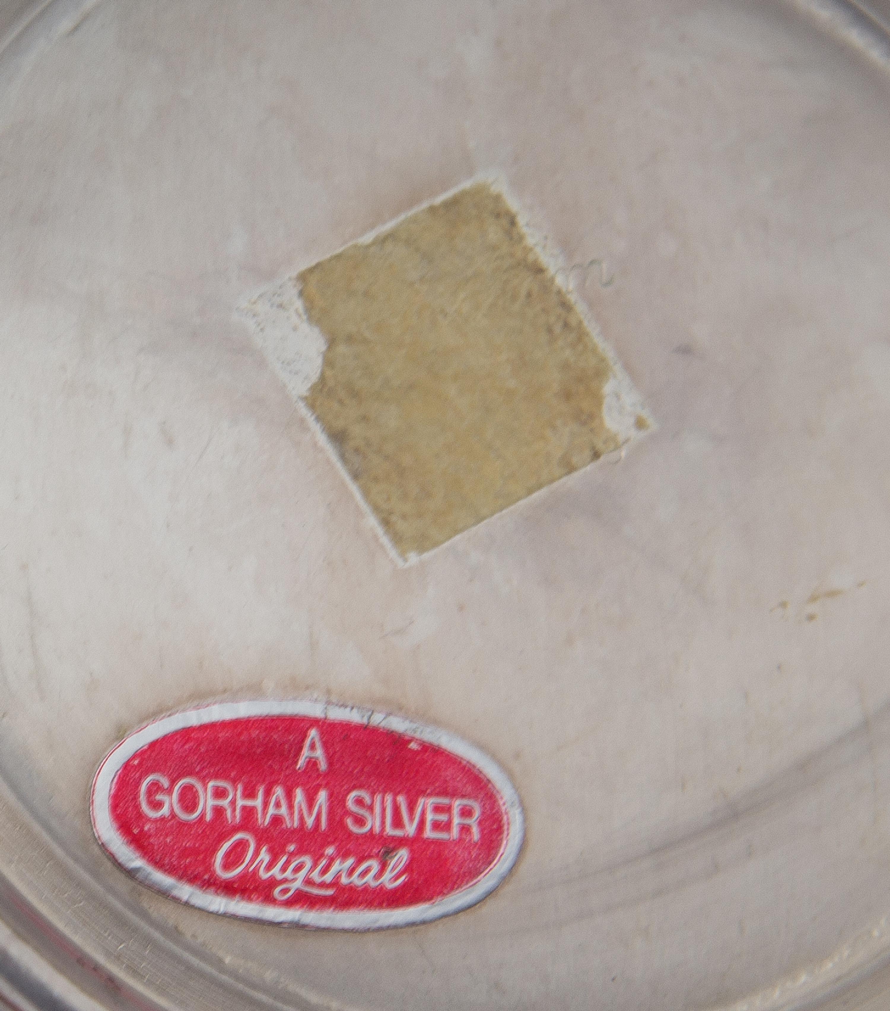 An American Silver Revere Bowl, Gorham Mfg. Co., Providence, RI, of typical form, having a flared rim and raised on a stepped circular