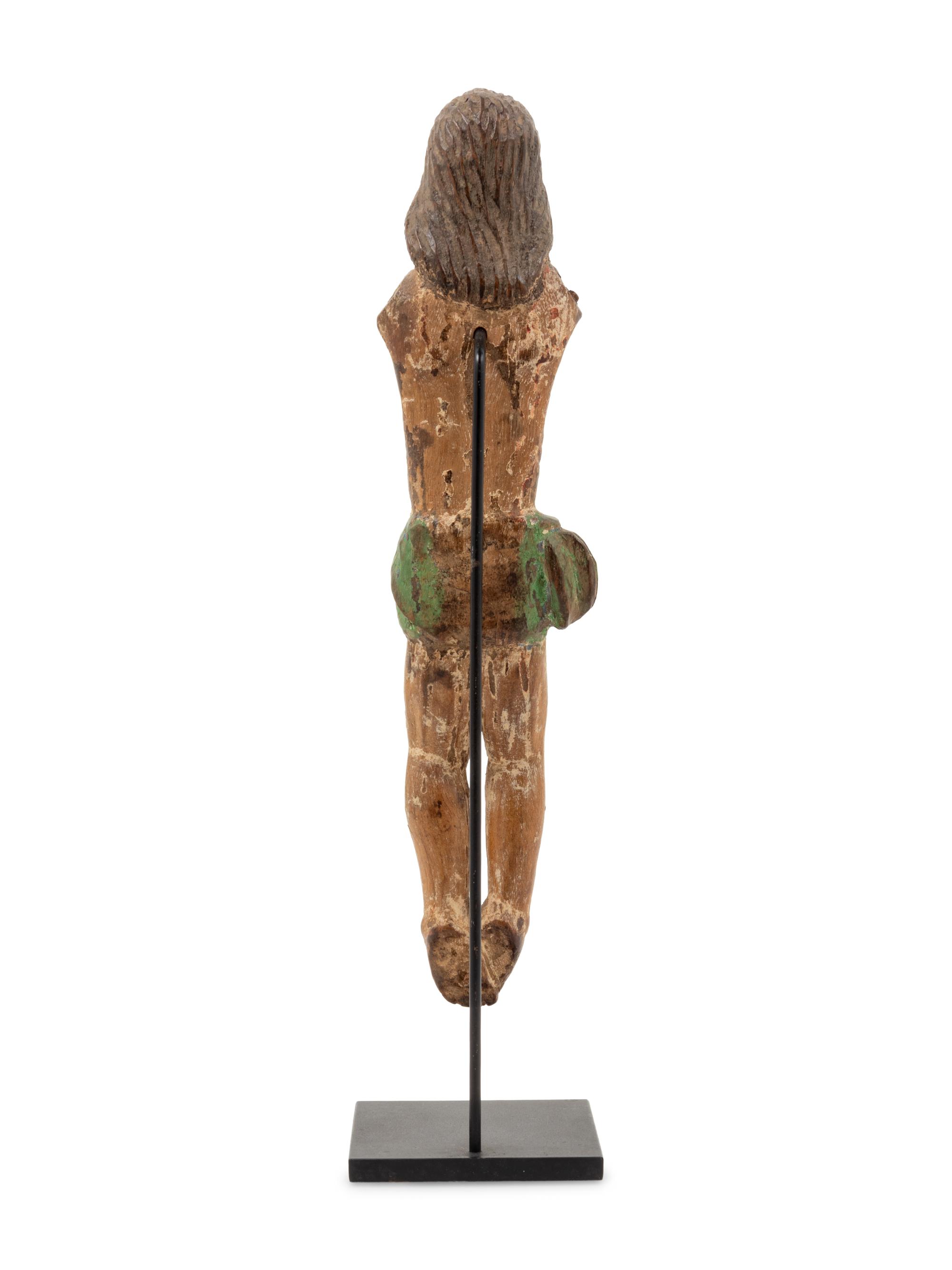 A Spanish Colonial Carved Wood Corpus Figure