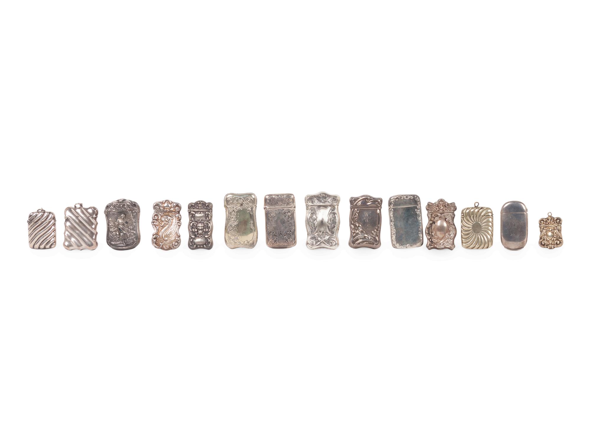A Group of Fourteen Silver Match Safes