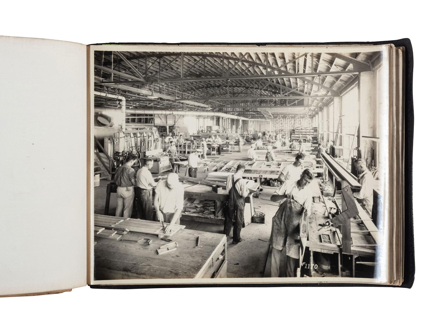 [AVIATION]. SMITH, Edgar B. (1896-1966), photographer. Rare photographic salesman aviation album documenting various airplanes and their construction at the plant of the Travel Air Manufacturing Company of Wichita, Kansas. Ca 1929.