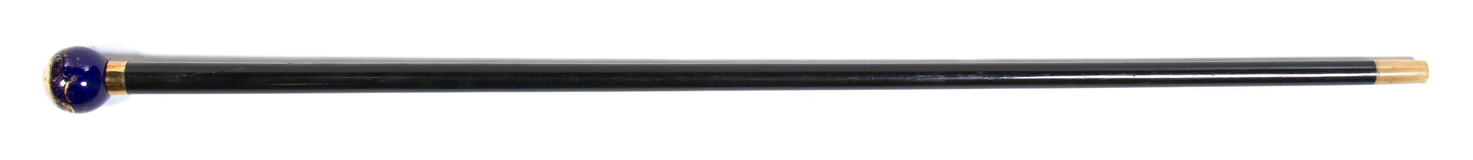 A Sevres Style Porcelain Mounted Walking Stick, Height overall 35 1/2 x diameter of handle 1 1/2 inches.