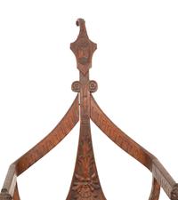 An Italian Carved Mahogany Gondola Chair with Swivel Seat