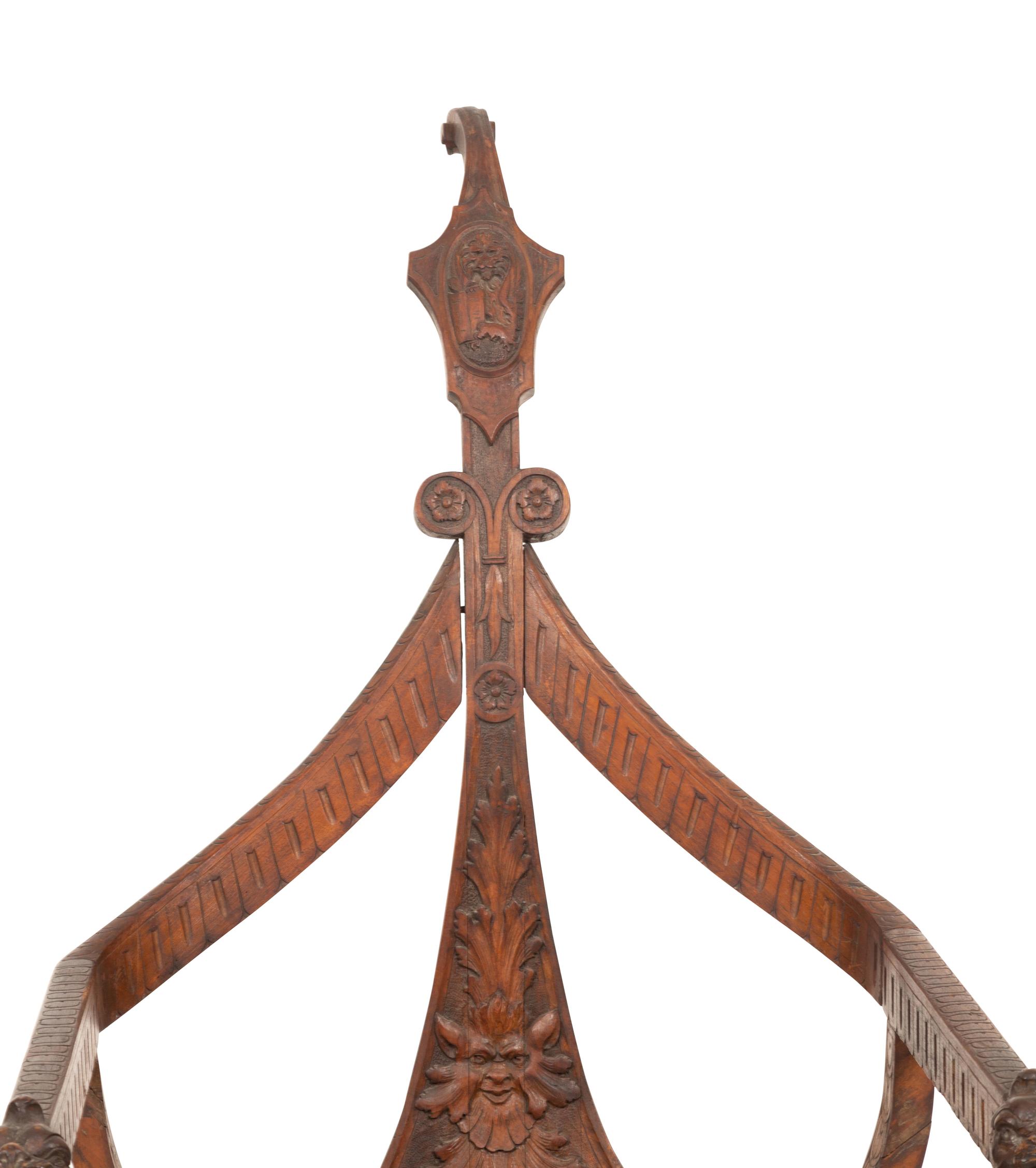 An Italian Carved Mahogany Gondola Chair with Swivel Seat