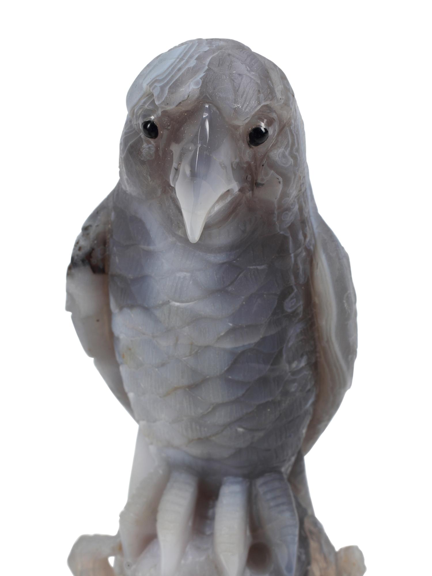 A Pair of Carved Hardstone Models of Parrots