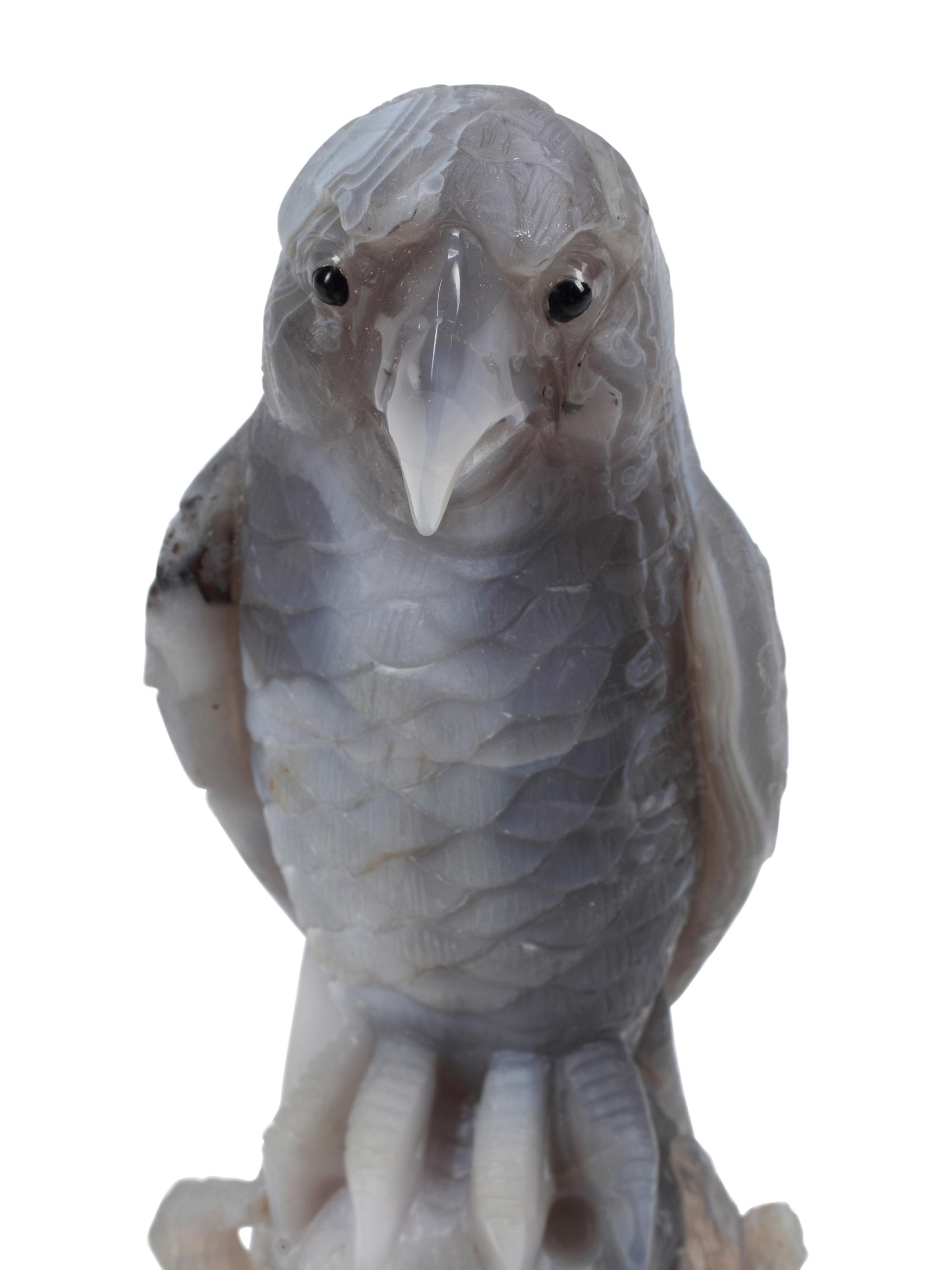 A Pair of Carved Hardstone Models of Parrots