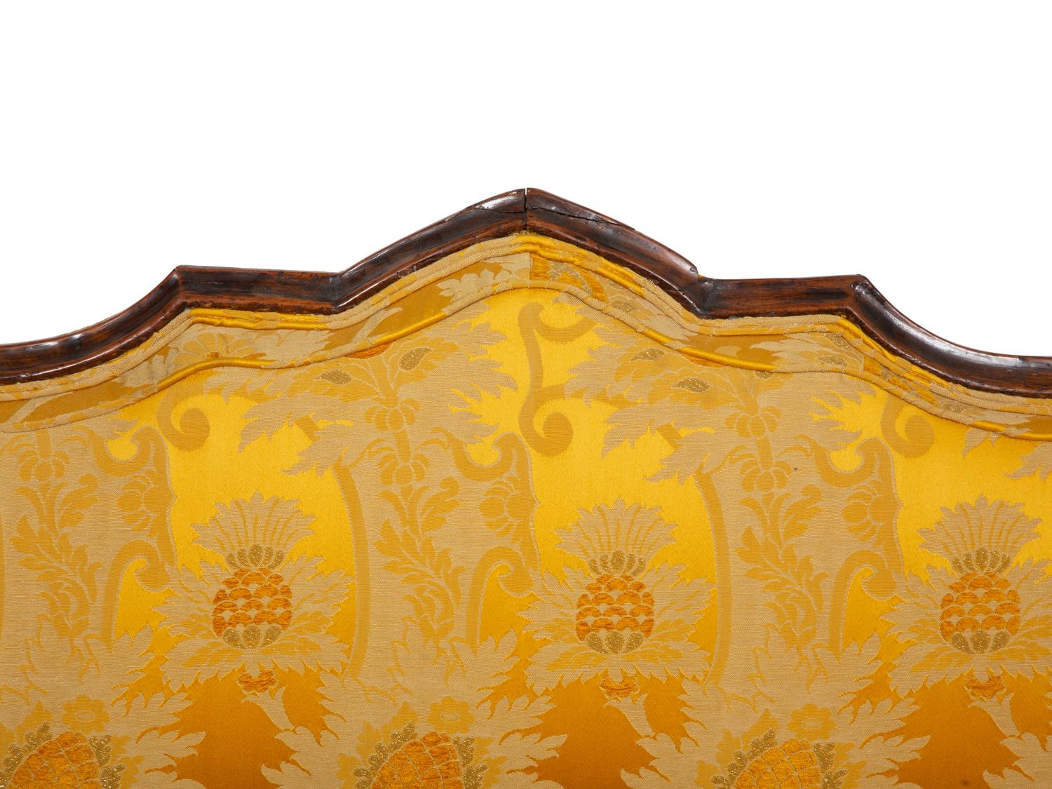A Louis XV Provincial Carved Walnut Settee