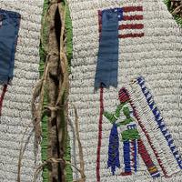 Sioux Beaded Buffalo Hide Pictorial Vest, American Flags and Warriors