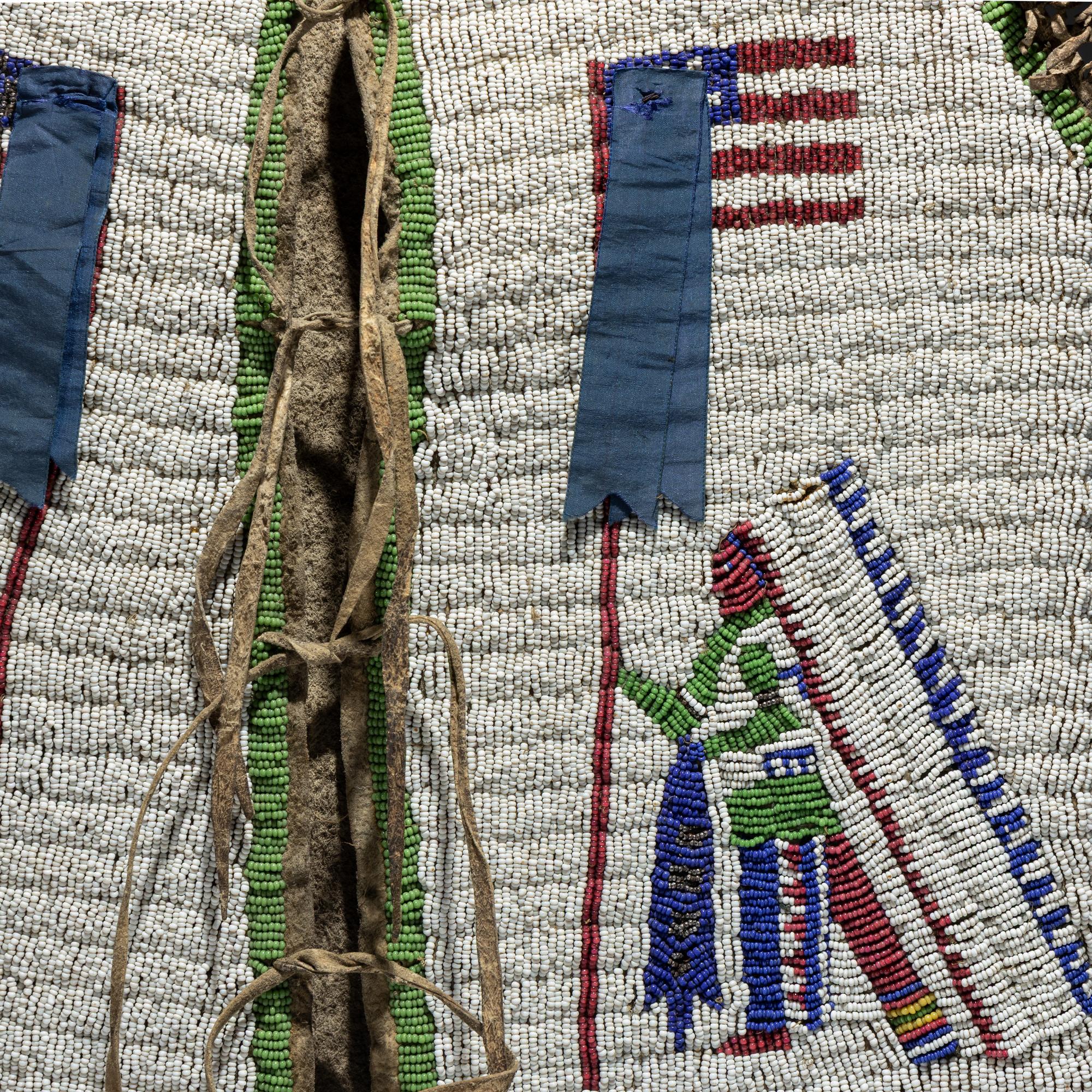 Sioux Beaded Buffalo Hide Pictorial Vest, American Flags and Warriors