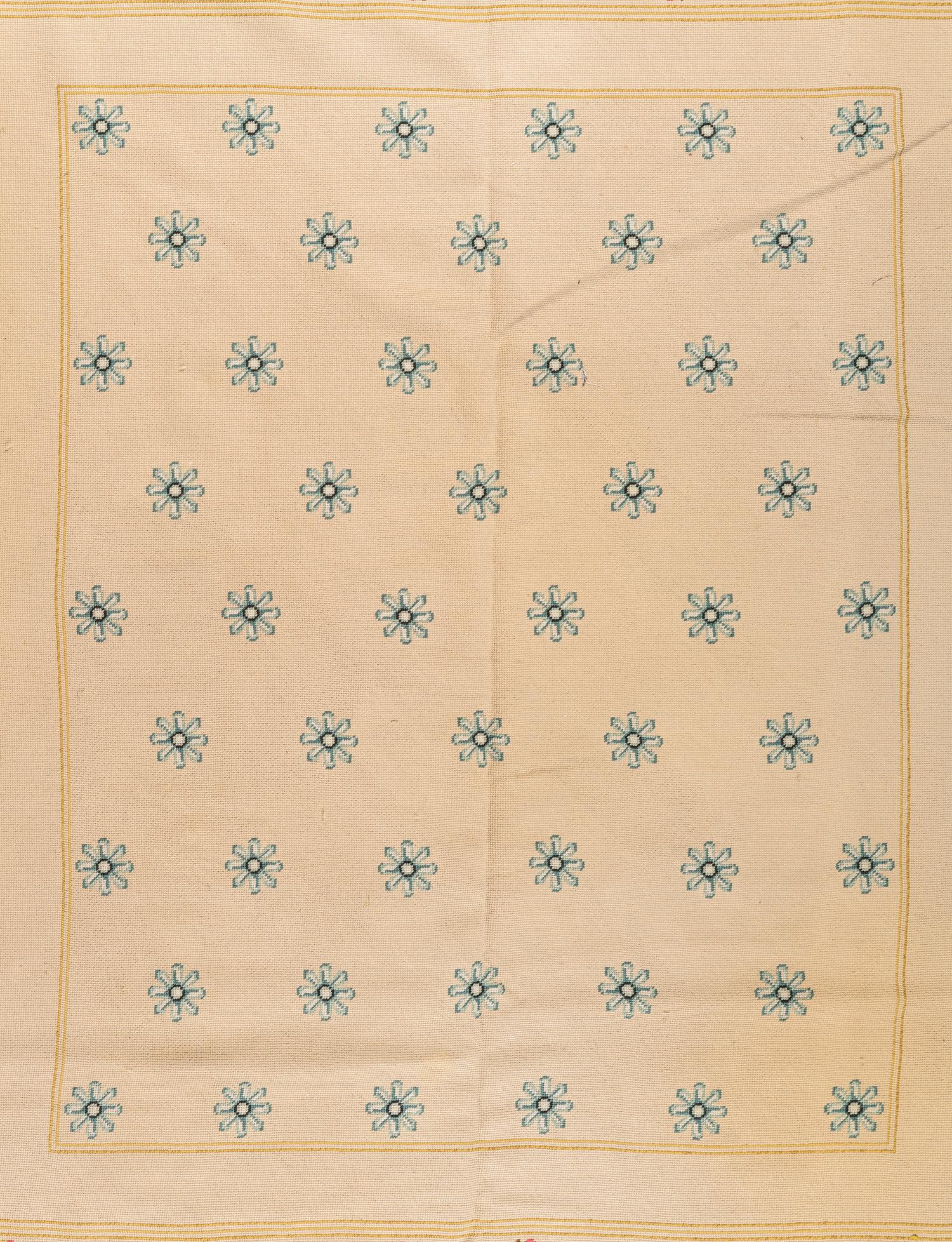 A Needlepoint Wool Rug
