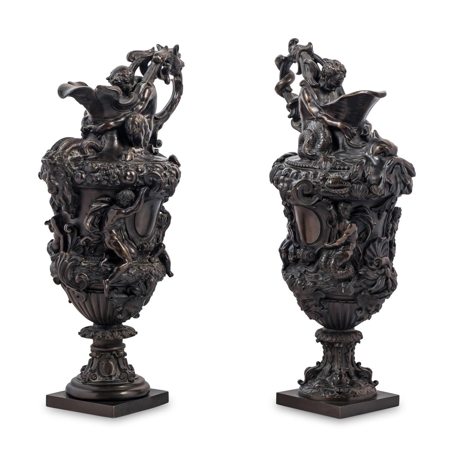 A Pair of Grand Tour Bronze Ewers Emblematic of Water and Earth
