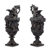 A Pair of Grand Tour Bronze Ewers Emblematic of Water and Earth