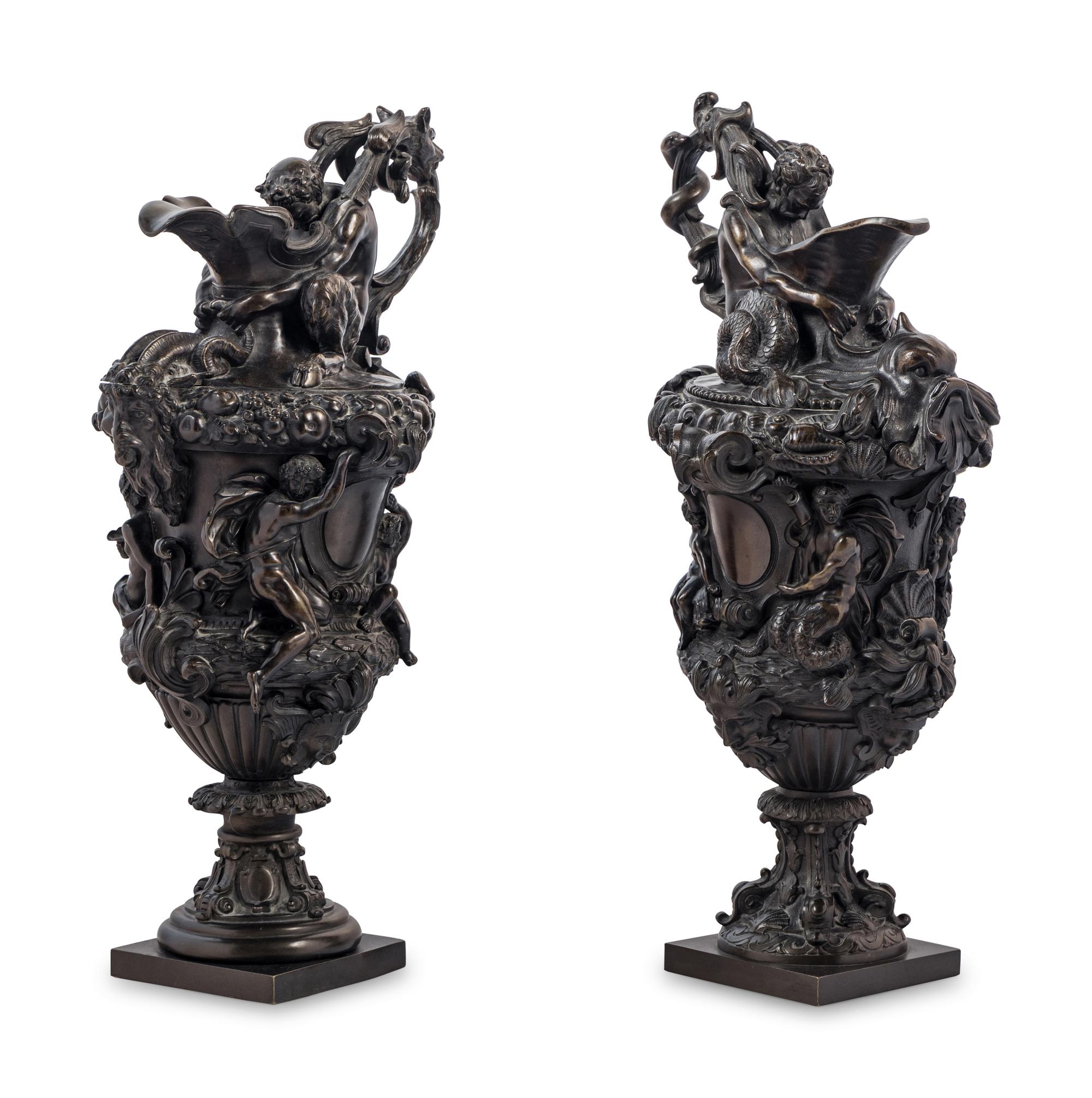 A Pair of Grand Tour Bronze Ewers Emblematic of Water and Earth