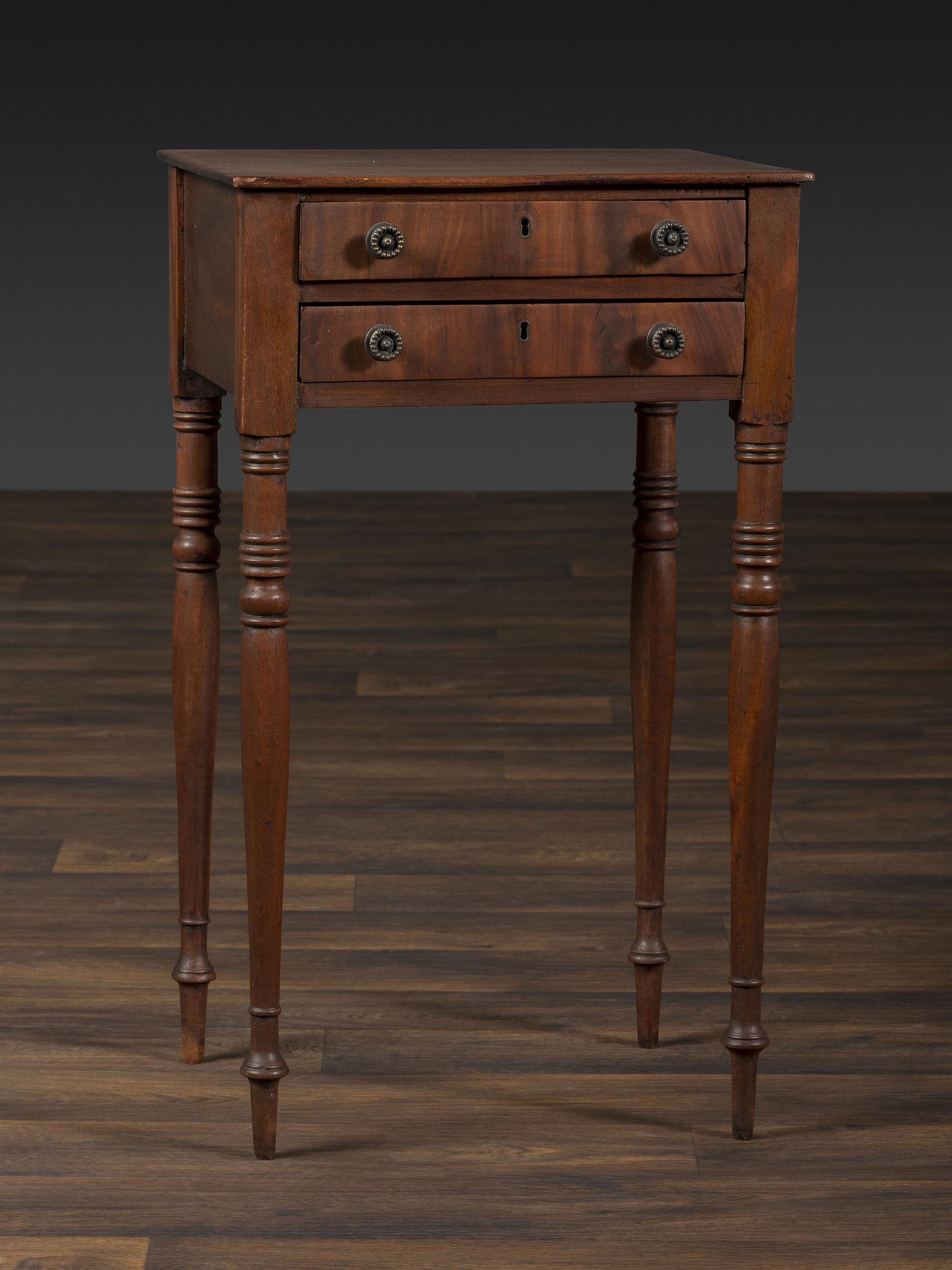 A Federal Turned and Figured Mahogany Two-Drawer Work Stand