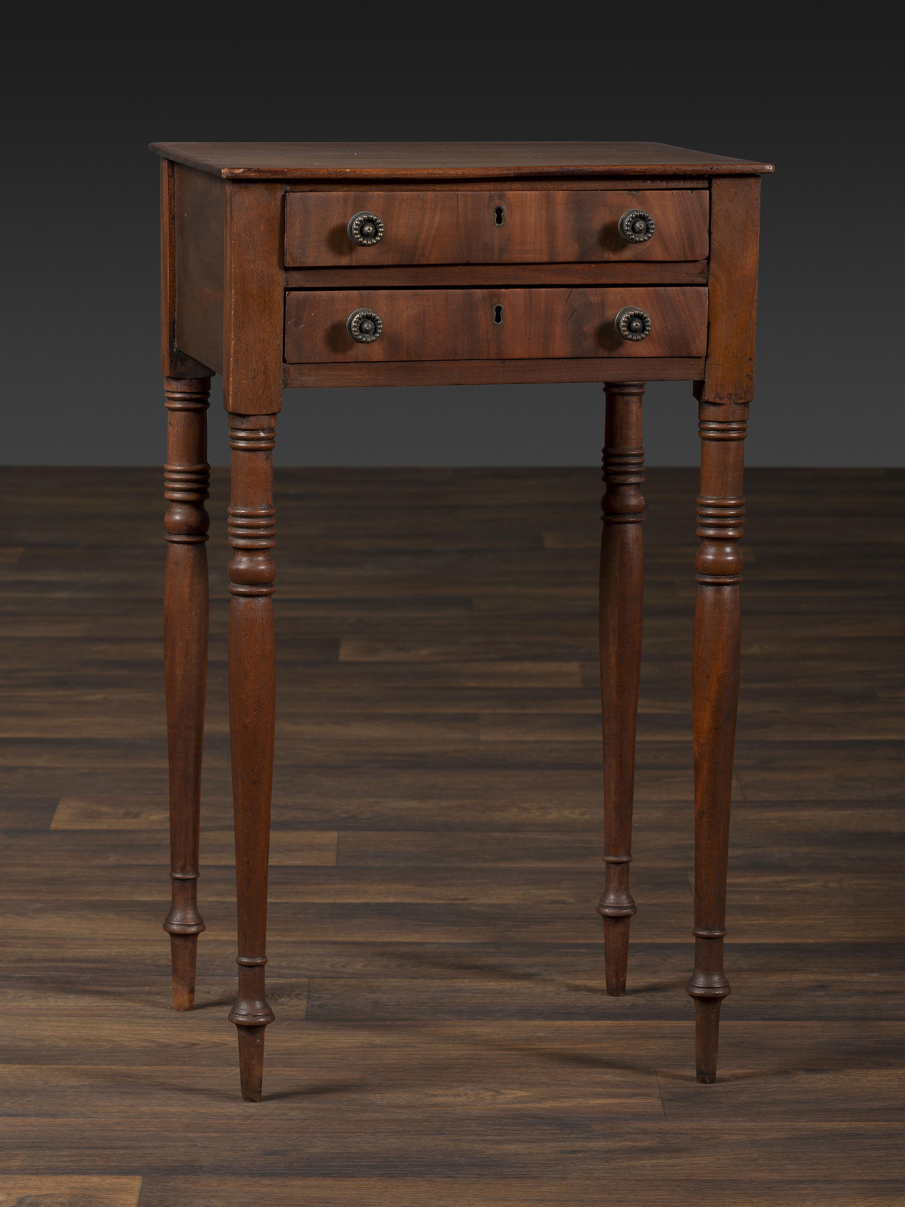 A Federal Turned and Figured Mahogany Two-Drawer Work Stand