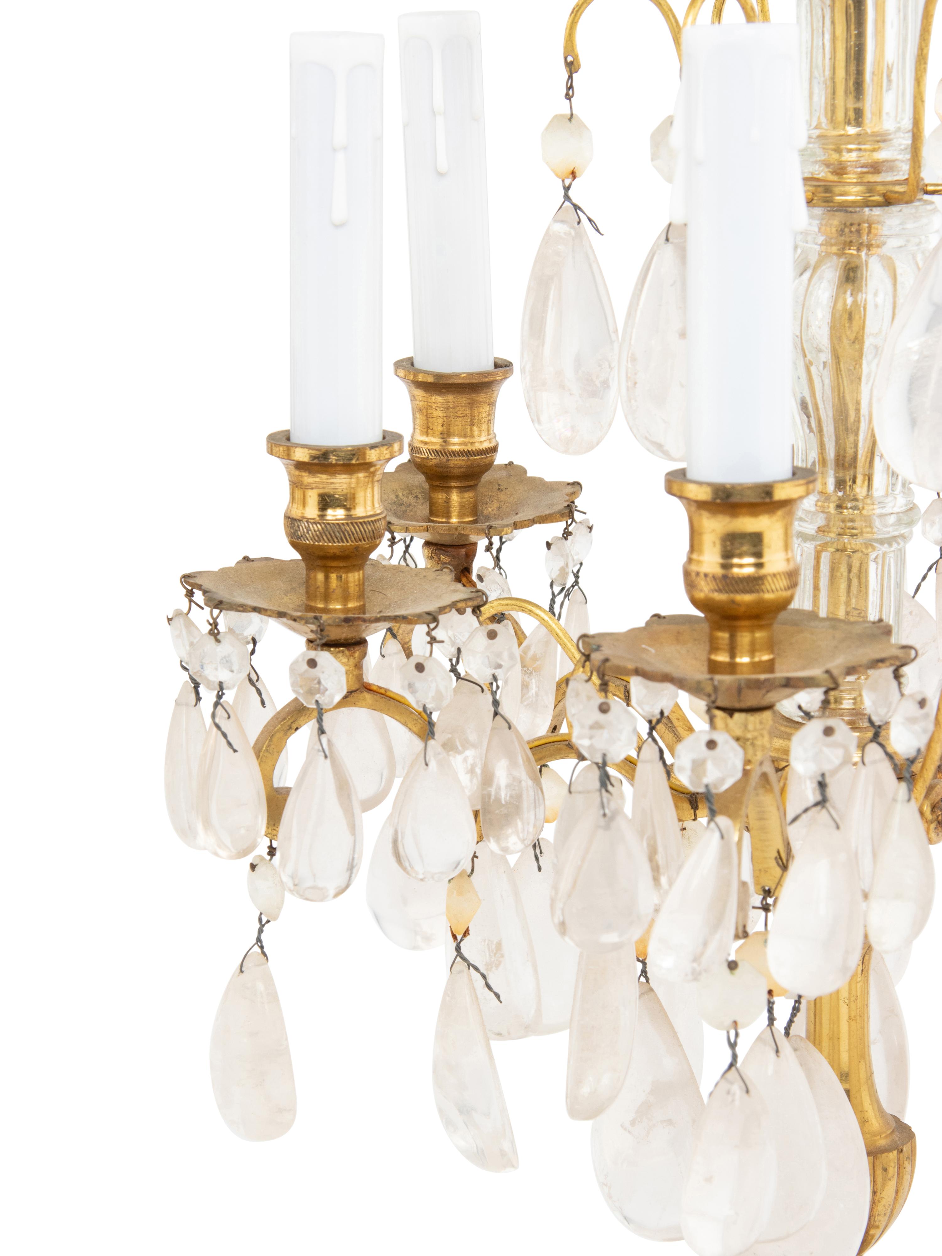 A Pair of French Gilt-Bronze and Rock Crystal Six-Light Girandoles