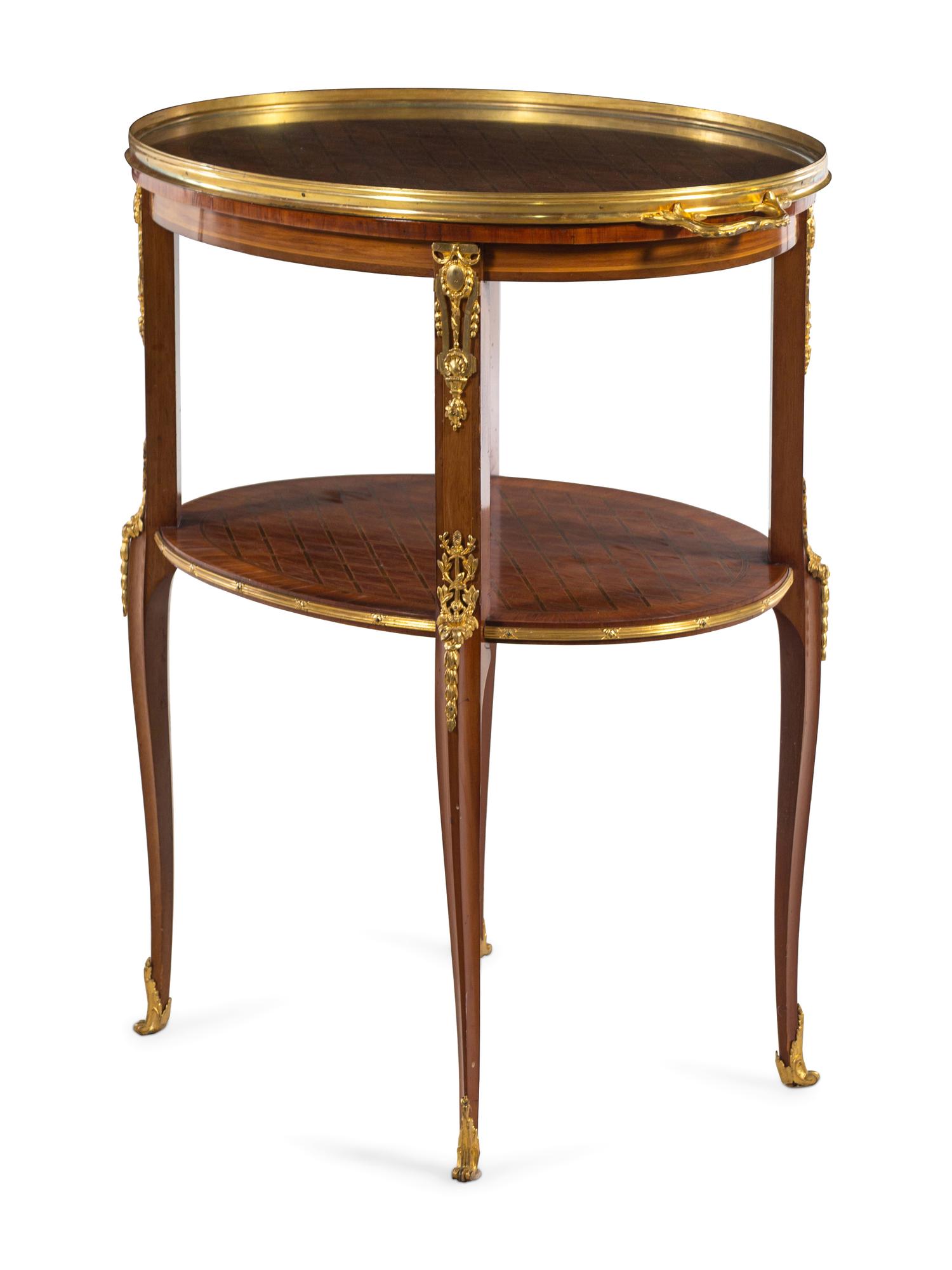 A Louis XVI Style Gilt Bronze Mounted Parquetry Serving Table