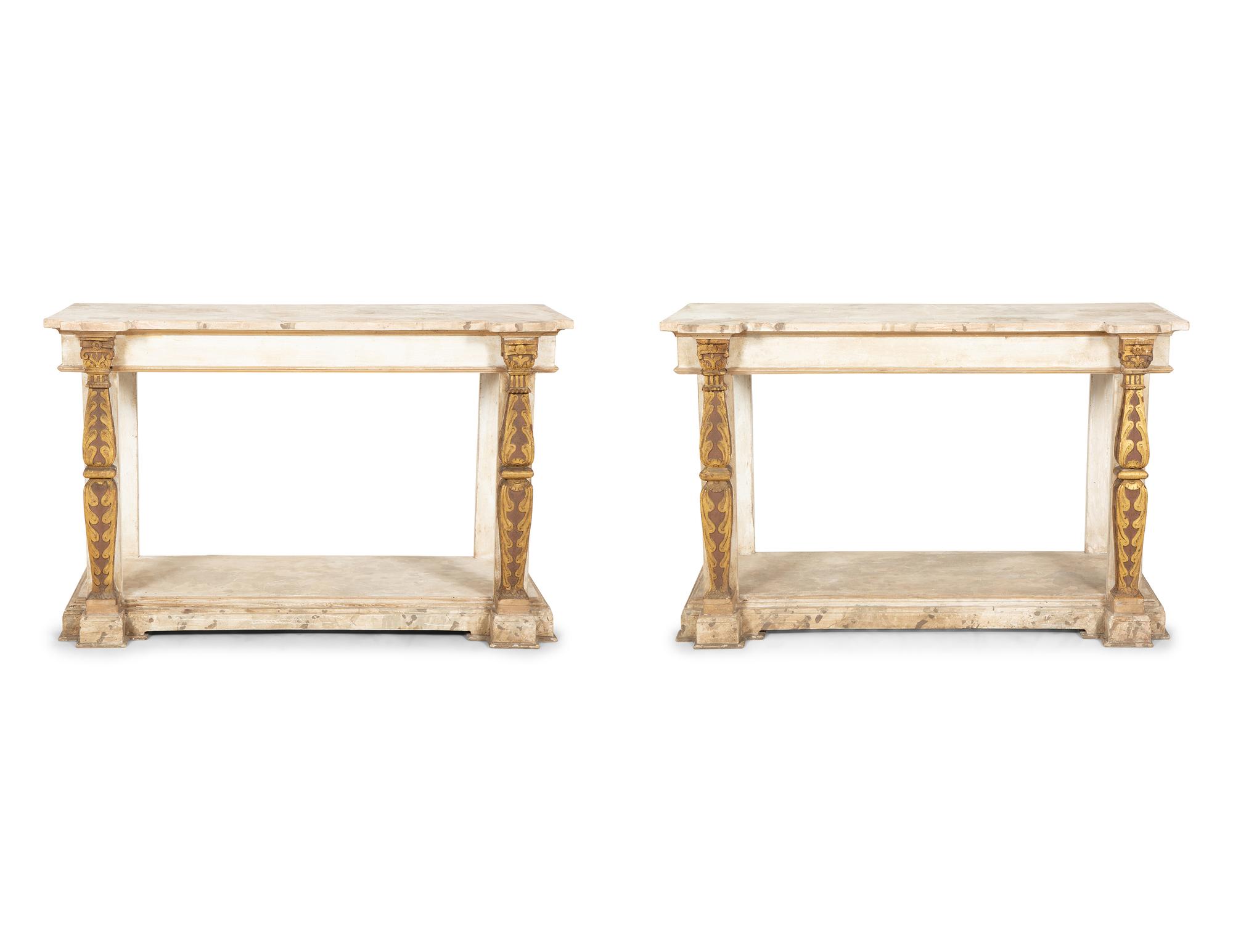 A Pair of French Neoclassical Painted and Parcel Gilt Pier Tables