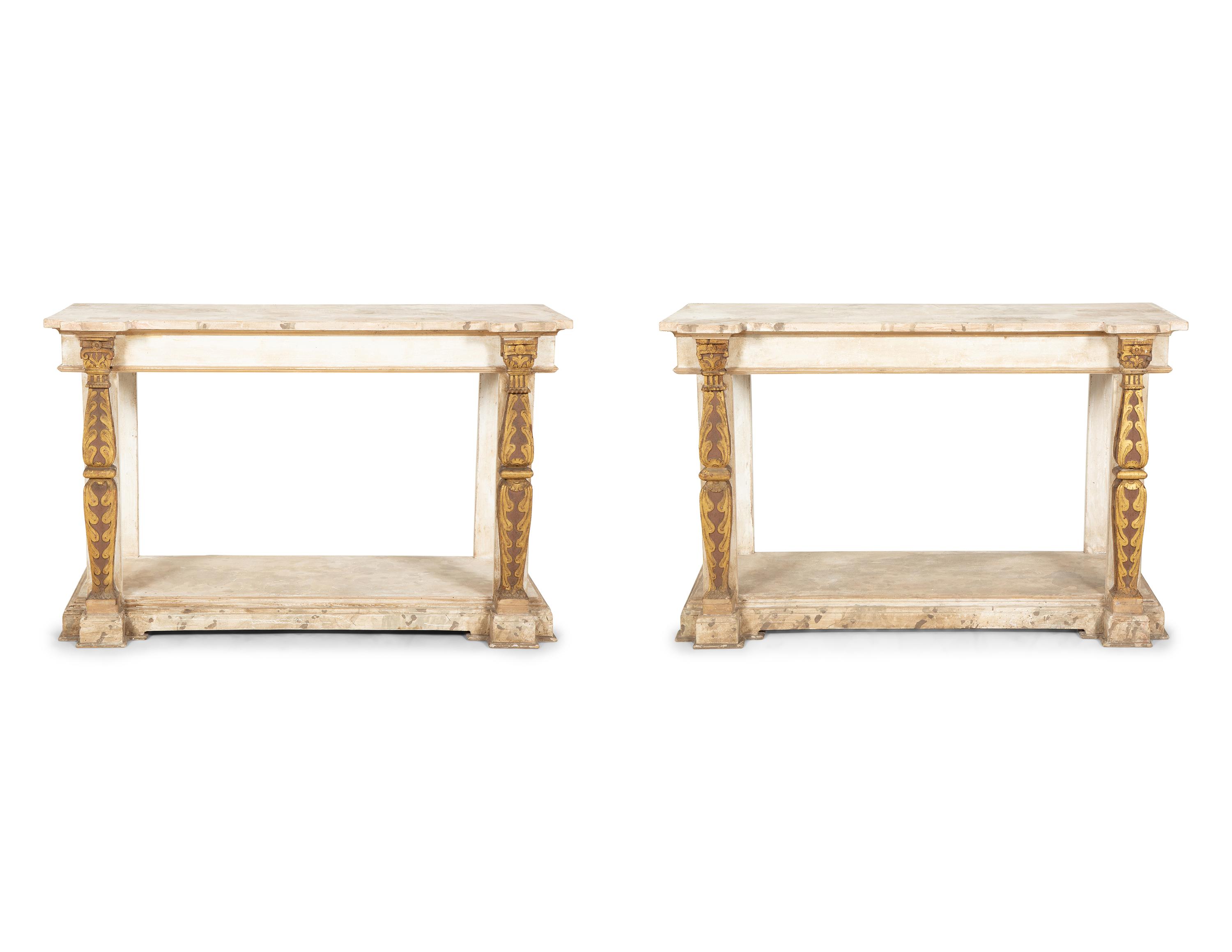 A Pair of French Neoclassical Painted and Parcel Gilt Pier Tables