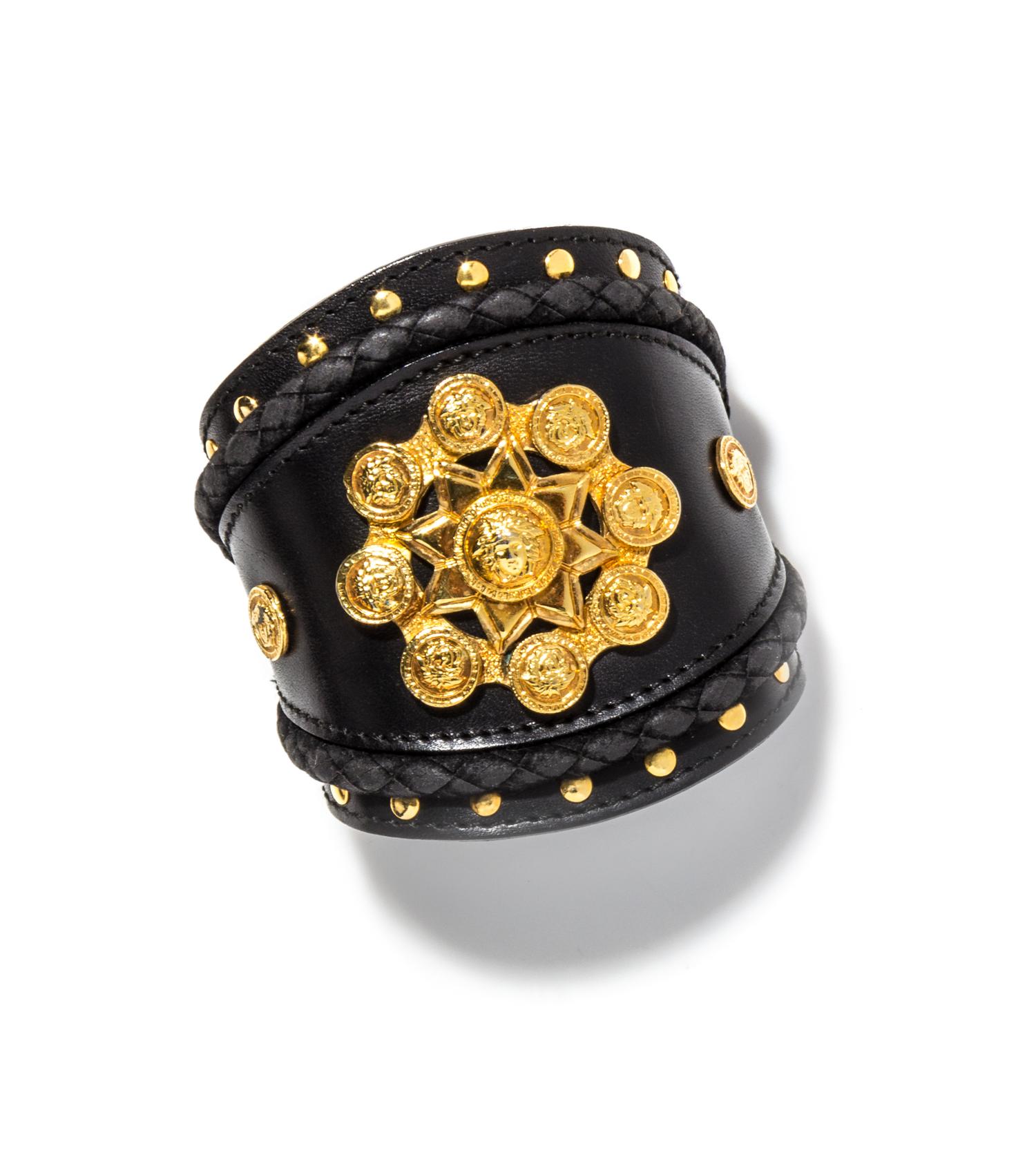 A Gianni Versace Black Leather Cuff, Width: 3.5"; Circumference: 6.5"- 7.25".