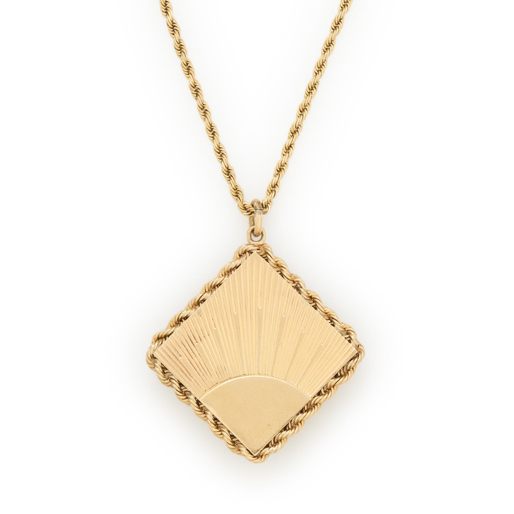 YELLOW GOLD AND GARNET HEART LOCKET NECKLACE