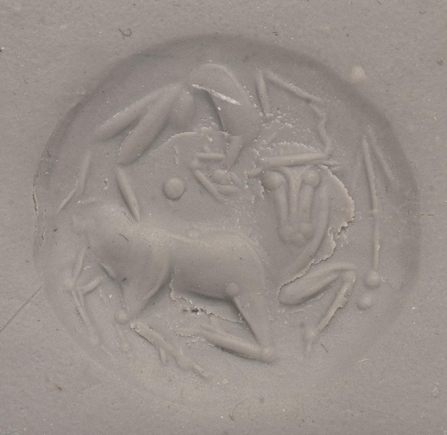 A Minoan Banded Agate Lentoid with an Acrobat Leaping Over a Bull